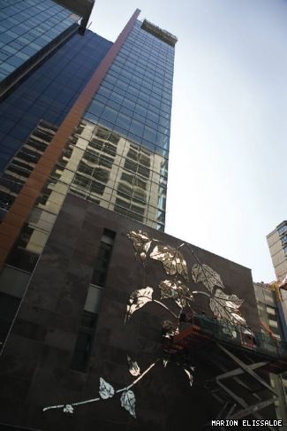 On May 11 and 12, the public art piece by Geneviève Cadieux, <em>Lierre sur Pierre</em>, was installed on the north face of the new JMSB building. Her work welcomes faculty and staff as they move to their new home. Cadieux chose to craft the ivy of mirrored material as a tribute to Concordia's historical dedication to access to education. 